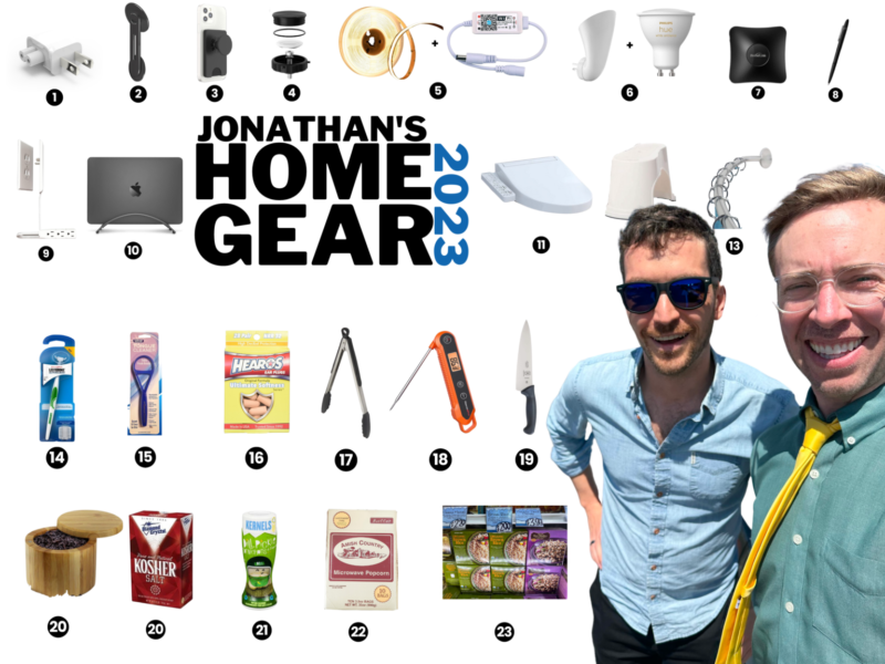 Home gear flat lay: laptop, smart home devices, and kitchen tools on a wood surface.